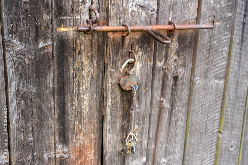 Old wooden door with keys.. Old wooden door with keys..