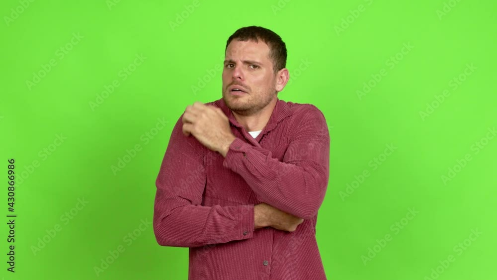 Brazilian handsome man freezing over isolated background Brazilian handsome man freezing over isolated background