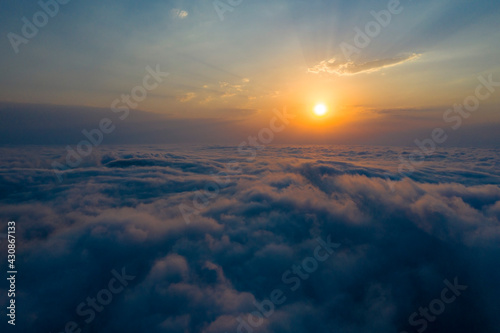 Mountains above the clouds beautiful sunset