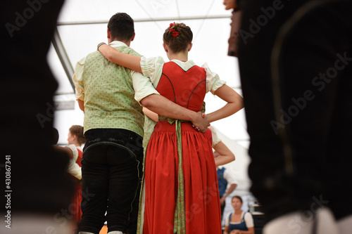 Public performance of traditional Austrian folk dances at the Festival of Folk Culture in Oberwang, Austria photo