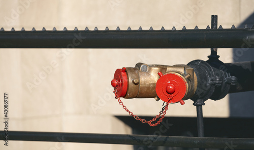 Close up picture of a standpipe on a street of New York, selective focus, USA.