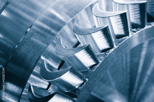 Steel blades of turbine propeller. Close-up view. In B/W. Selected focus on foreground, engineering technology concept photo