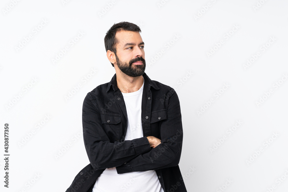 Young man with beard over isolated white background portrait Young man with beard over isolated white background portrait