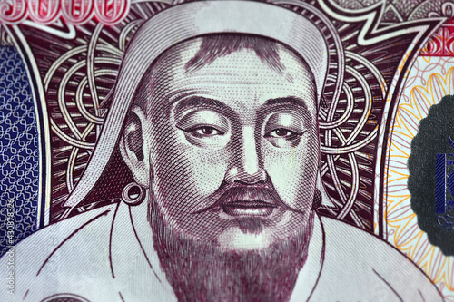 a portrait of gengis khan on a mongolian banknote photo