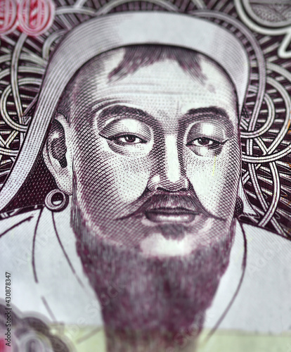 a portrait of gengis khan on a mongolian banknote