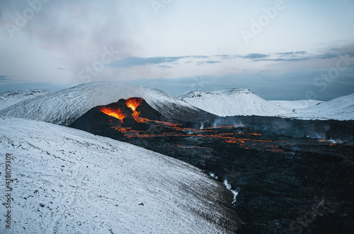 Iceland Volcanic eruption 2021. The volcano Fagradalsfjall is located in the valley Geldingadalir close to Grindavik and Reykjavik. Hot lava and magma coming out of the crater. photo