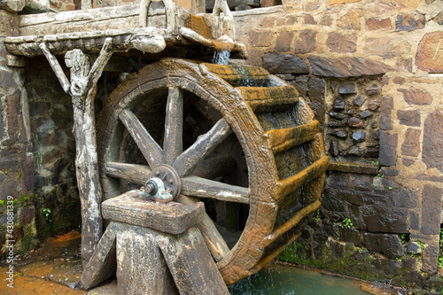 Old water mill water flowing