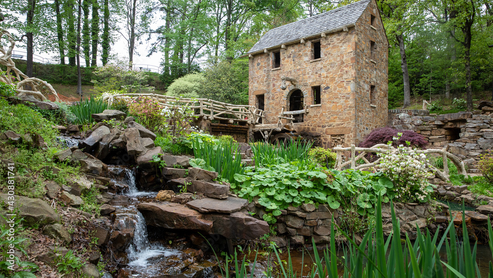 old stone Mill in spring water flowing old stone Mill in spring water flowing