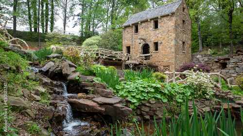 old stone Mill in spring water flowing