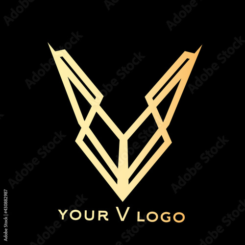 3d graphic of a black and gold symbol made of many spheres letter v