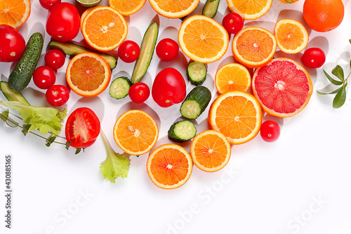 Fresh summer tropical fruits and vegetables on a bright sunny table, citrus mix, detox diet and weight loss concepts, banner, advertising for a store, healthy and natural food
