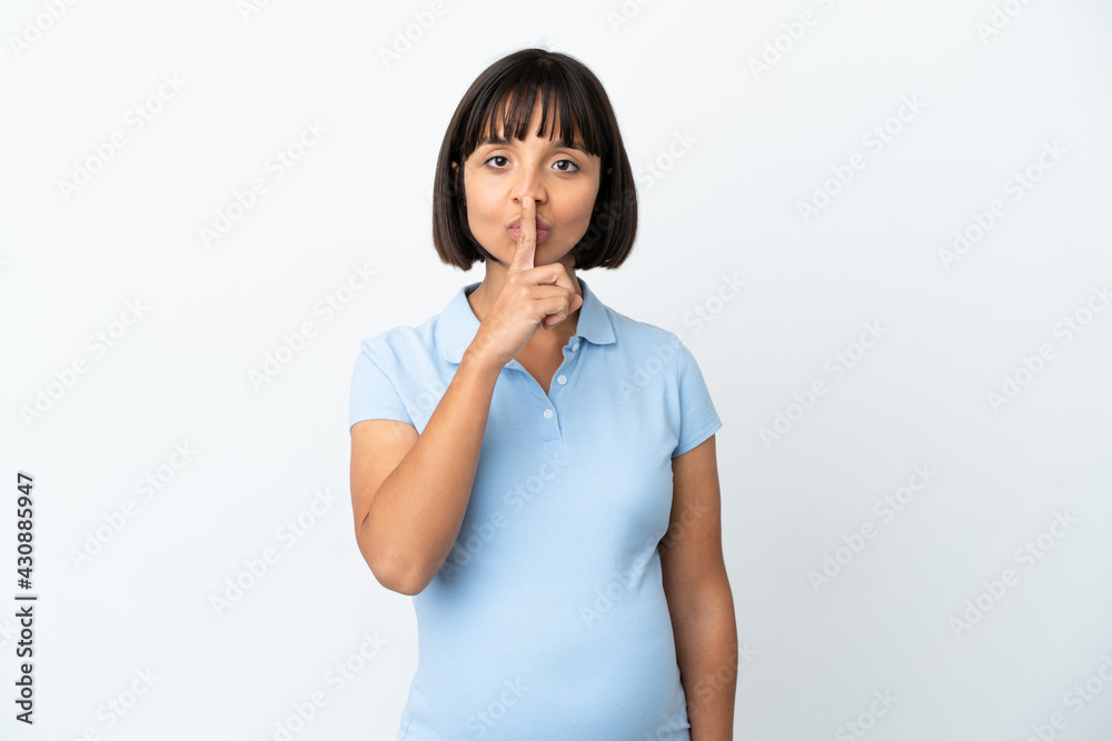 Pregnant woman over isolated white background showing a sign of silence gesture putting finger in mouth Pregnant woman over isolated white background showing a sign of silence gesture putting finger in mouth