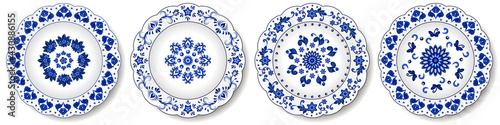 Porcelain plates, blue on white pattern in oriental asian style. Abstract floral ornament with Chinese and Indian design  motives. Decorative plate or dish isolated. Vector illustration
