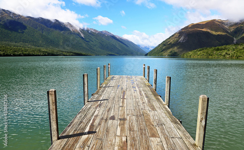 Wooden pier on Rotoiti Lake - Nelson Lakes National Park, New Zealand photo