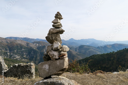 View of a cairn in the Rocca Sparviera ghost village, France © jonas
