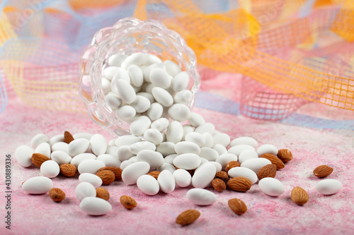 Close up of a group of white sugared almonds. Almond candies. Candies background top view, almond sweets. Sugar Feast, (Feast of Ramadan) Ramadan concepts.
