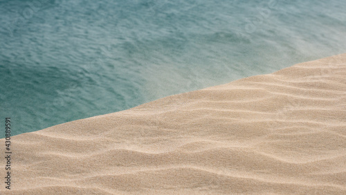 Windy day on the sand dunes in Qatar.