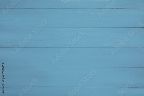 Texture of light blue wooden surface as background, top view