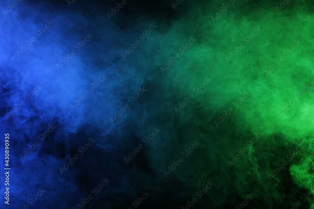 Smoke in blue green light on black background Stock Photo | Adobe Stock