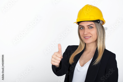 engineer woman in yellow helmet.