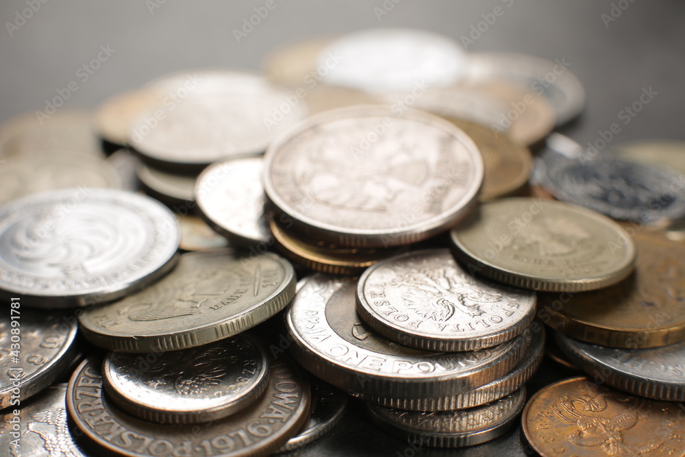 Many coins on a black background. Close up Many coins on a black background. Close up