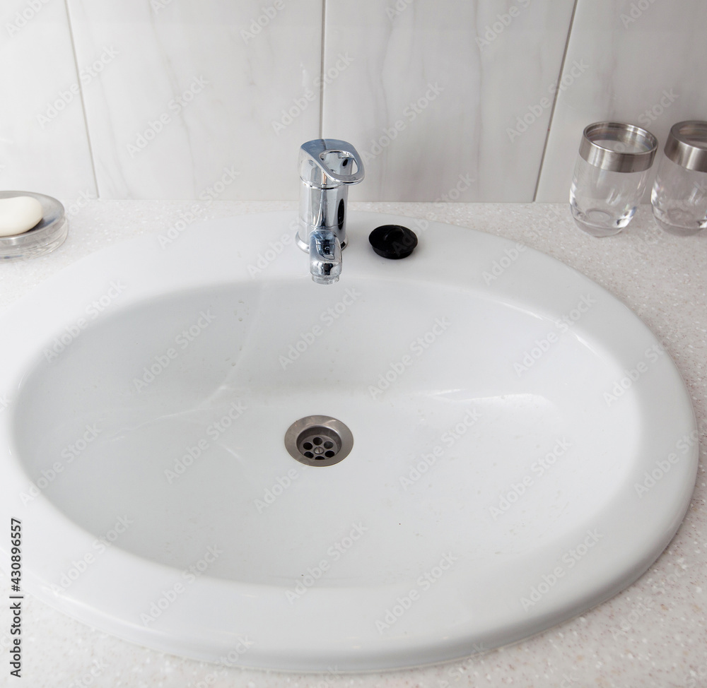 Bathroom interior with white sink Bathroom interior with white sink