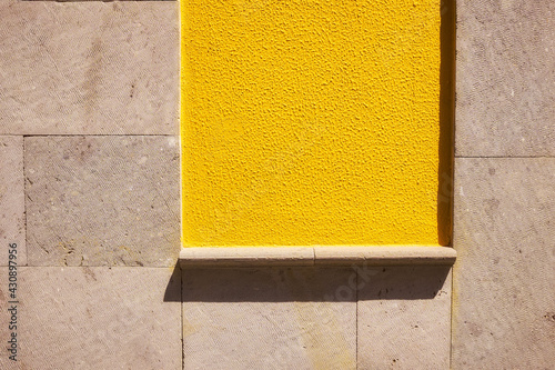 yellow wall with fine brick photo