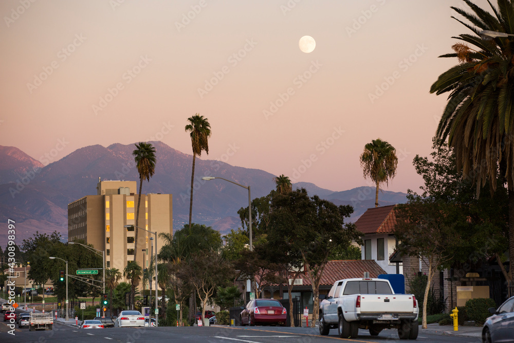 Twilight sunset view of the skyline of downtown San Bernardino, California, USA.