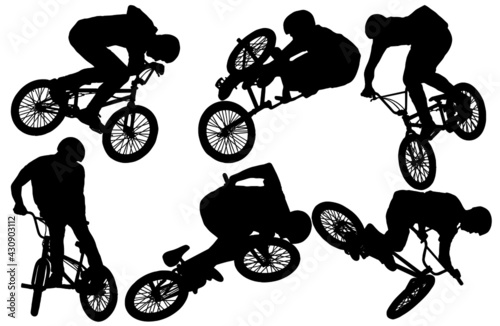 BMX bicyclist silhouettes in black on white background 
