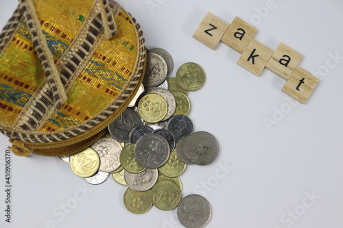 Zakat letters with coins