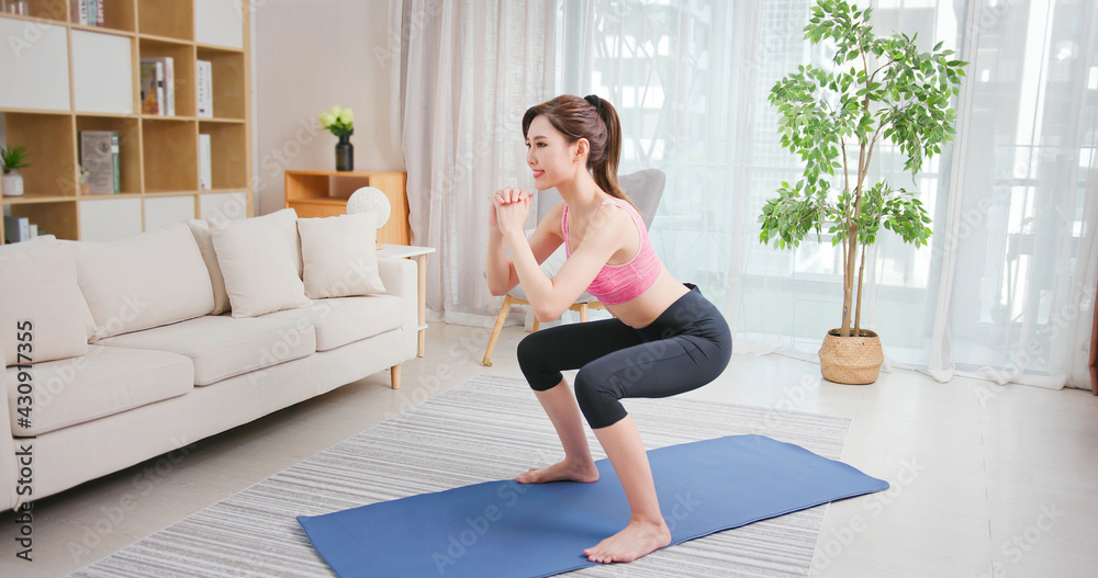 woman doing exercise at home woman doing exercise at home