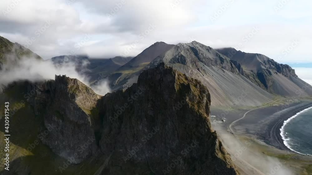 Epic aerial timelapse of clouds moving over mountain iceland.