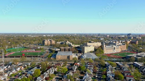 Slider Right Drone Shot of St. John’s University Campus and the Surrounding Neighborhoods