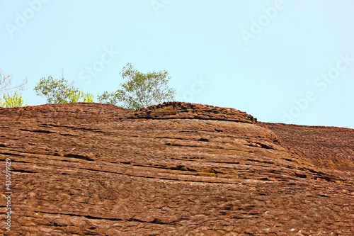 the geological phenomeno brown or red stone different shape and size in Buengkan Thailand photo