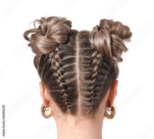 Beautiful young woman with braided hair on white background photo