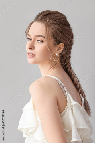 Beautiful young woman with ...