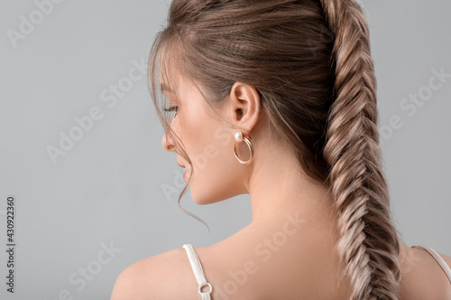Beautiful young woman with ...