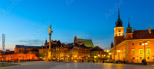 Evening panorama of Castle Square with Royal Castle and Sigismund III Waza column in Starowka Old Town historic district of Warsaw, Poland photo