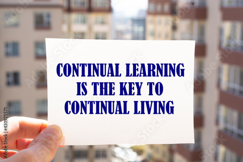 Inspirational motivational quote. Continual learning is the key to continual living.