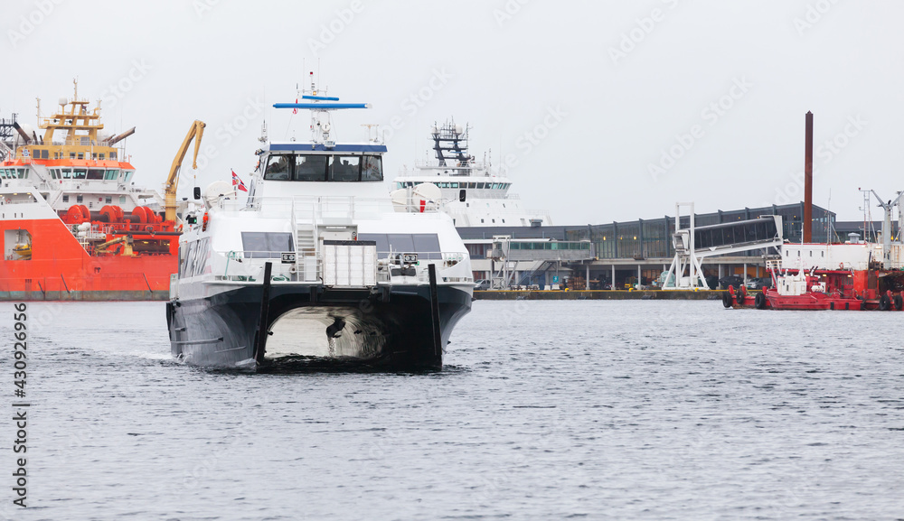 Catamaran fast passenger ferry enters the port of Bergen