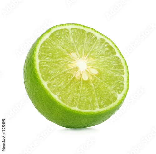 Half of lime citrus fruit isolated on white background.