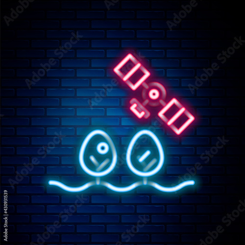 Glowing neon line Smart farm with drone control and tree icon isolated on brick wall background. Innovation technology for agricultural company. Colorful outline concept. Vector