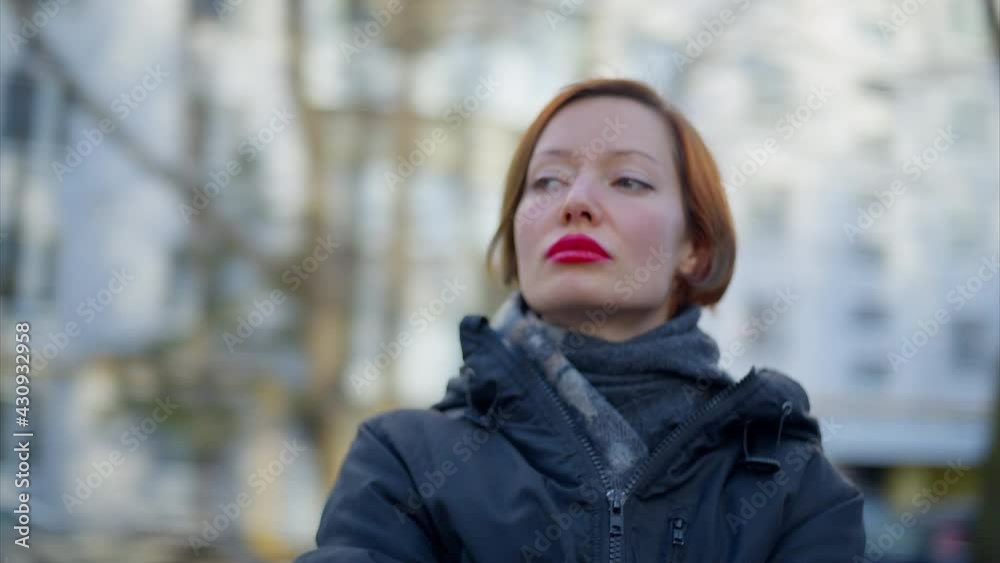 Young woman in scarf outdoors. Spring is coming, winter is over, what will life bring next? Young woman in scarf outdoors. Spring is coming, winter is over, what will life bring next?