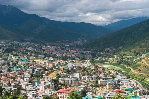 Top view Thimpu city, the capital of Bhutan surrounded by mountains in summer season