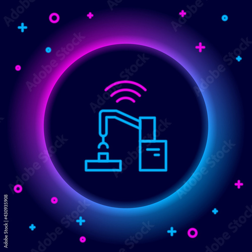 Glowing neon line Industrial machine robotic robot arm hand factory icon isolated on black background. Industrial robot manipulator. Colorful outline concept. Vector