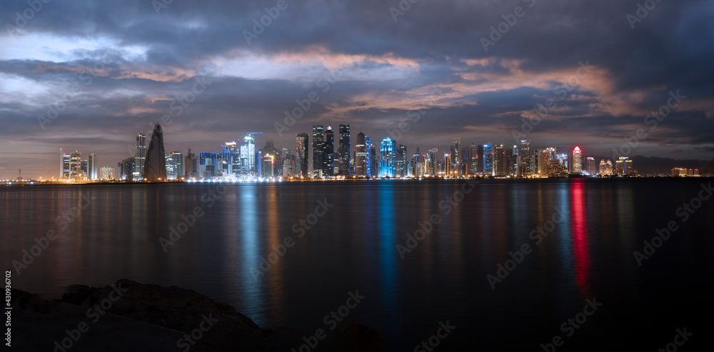 The skyline of Doha, Qatar after sunset 