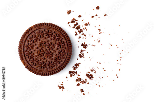 Chocolate cookie with milk filling isolated on white background. Top view.