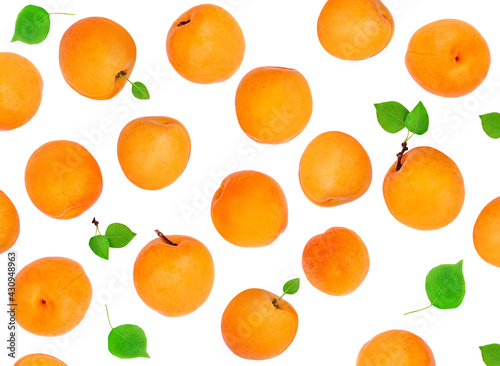 Fresh Apricot fruits with leaves isolated on white background. Top view. Flat lay. Apricot Pattern.