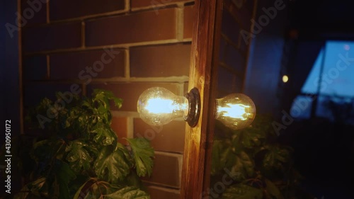 Close-up of fluorescent lamps. Camera movement.