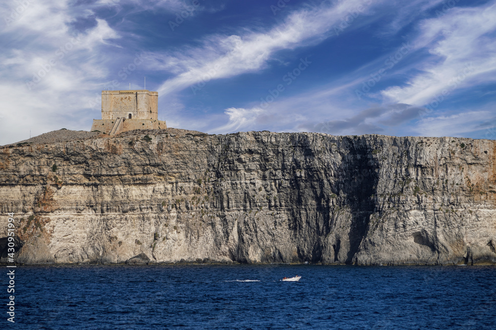 Castle on the coast (St Mary Fortress), cliff in Comino, Malta